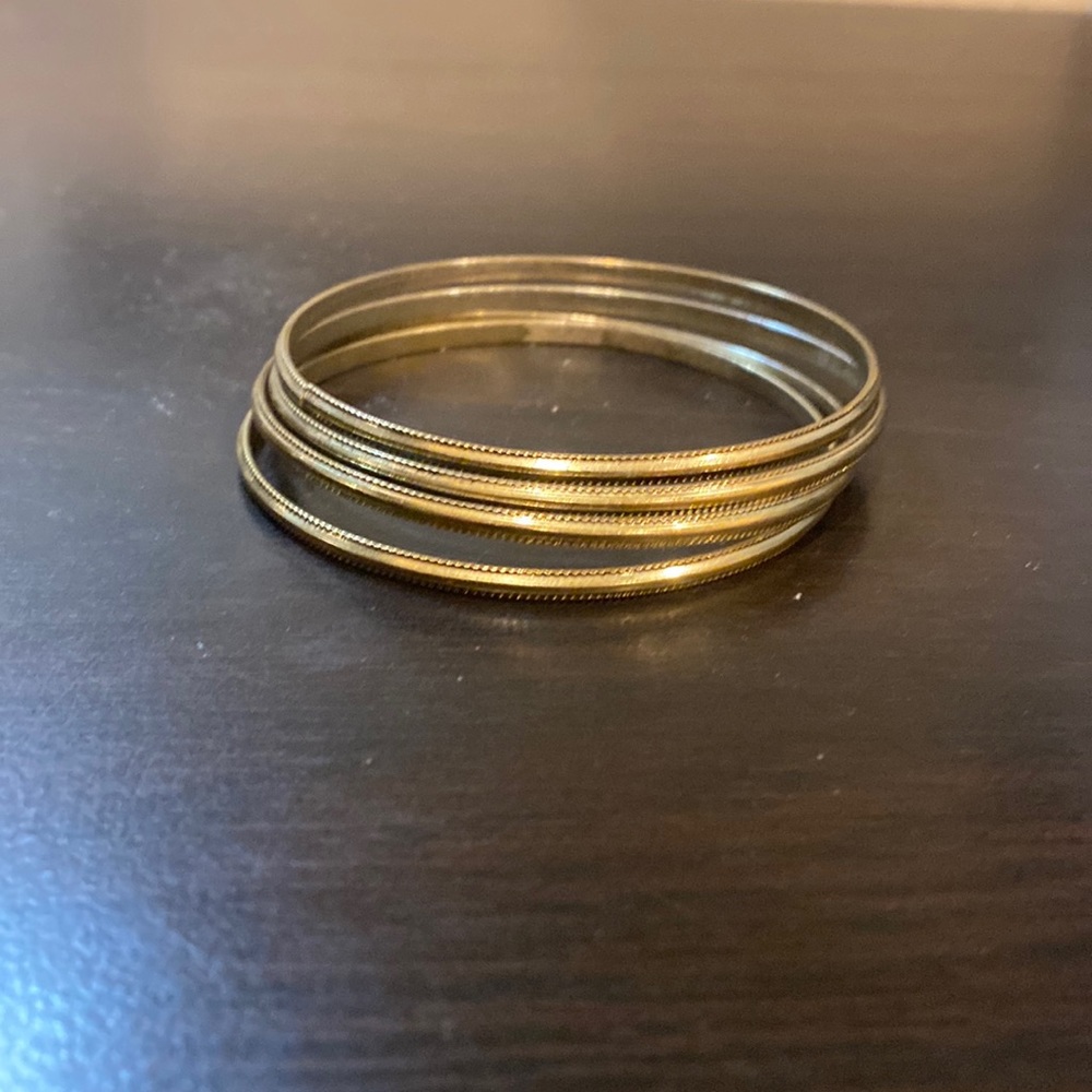 Vintage gold-toned set of 4 bangle bracelets